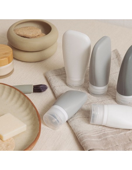 NECESER TRANSPARENTE C/BOTELLAS P/VIAJE